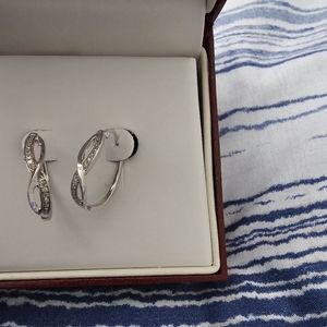 - Infinity hoop earrings, never worn. By Helzberg diamonds.